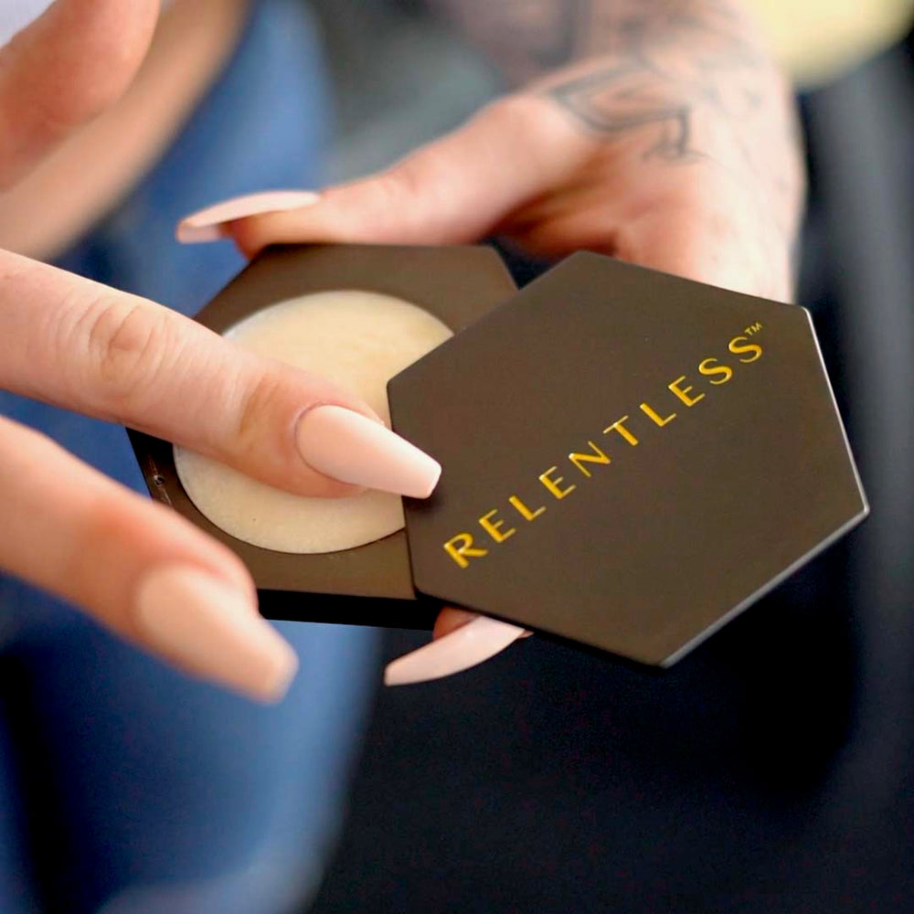 15 ml jar of Rehab Tattoo Balm Hex with natural ingredients like argan oil, aloe vera, and coconut oil for tattoo care.