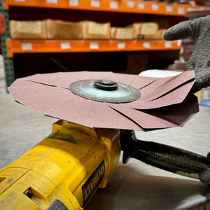 10-inch Renegade Abrasive Pinwheel with Aluminum-Oxide flaps for metal surface preparation, color-coded for easy assembly.