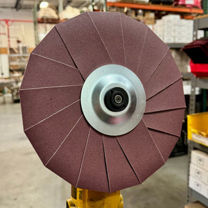 10-inch abrasive pinwheel from Renegade Products for aggressive removal of surface imperfections on metal.