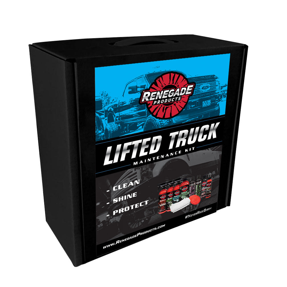 Complete lifted truck maintenance kit with specialized cleaning and polishing products displayed on a table.
