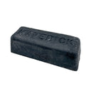 Applying Renegade's high-quality metal polishing compound to a buffing wheel for optimal metal surface polishing.