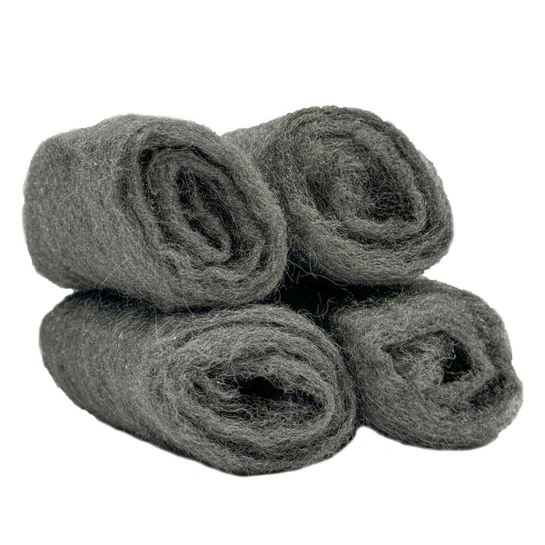 Four rolls of #0000 steel wool for polishing metals and cleaning tire whitewalls, displayed in packaging.