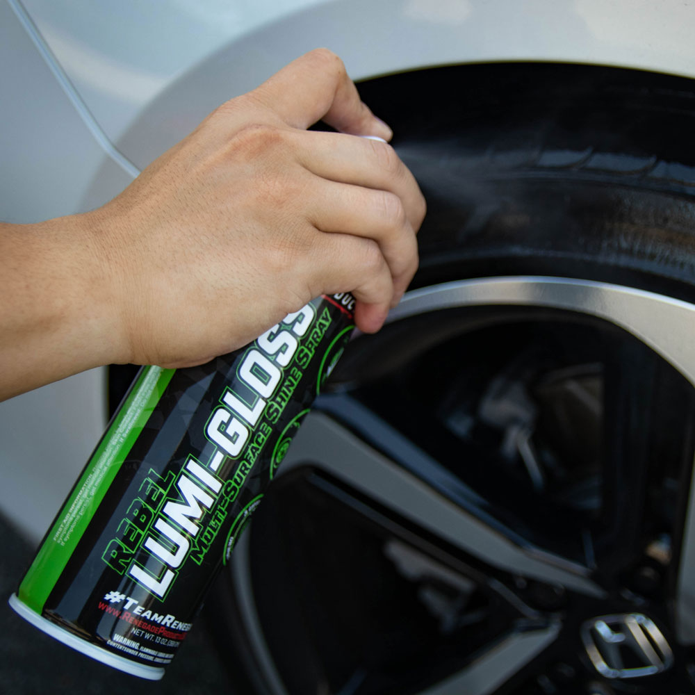 Alt text: Renegade Lumi-Gloss Multi-Surface Shine Spray bottle, ideal for enhancing and protecting vehicle surfaces.