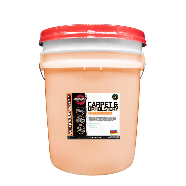 Bottle of Carpet & Upholstery Shampoo with labels detailing usage for vehicle interiors, ingredients, and application instructions.