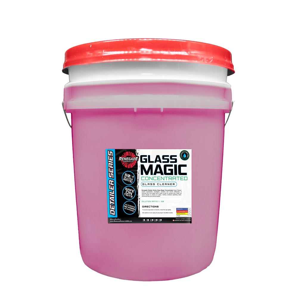 Alt text: Bottle of Glass Magic Concentrated Glass Cleaner with a waffle weave towel, ideal for cleaning glass surfaces without streaks.