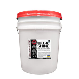 Bottle of Mega Shine Rubber, Vinyl, & Plastic Dressing with cherry scent for car detailing.