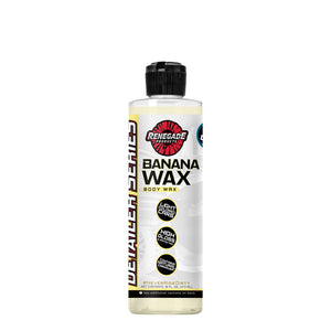 Bottle of Banana Wax Vehicle Body Wax with a microfiber applicator pad, showcasing its glossy, high-shine finish on a car.
