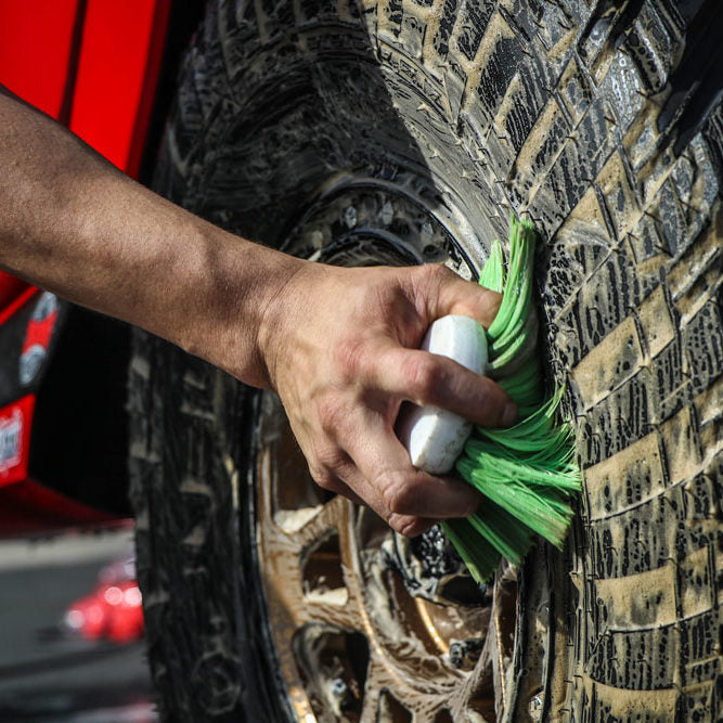 Alt text: Nylex Handle Brush by Renegade, ideal for cleaning engine bays and tire grime, compatible with various cleaners and degreasers.
